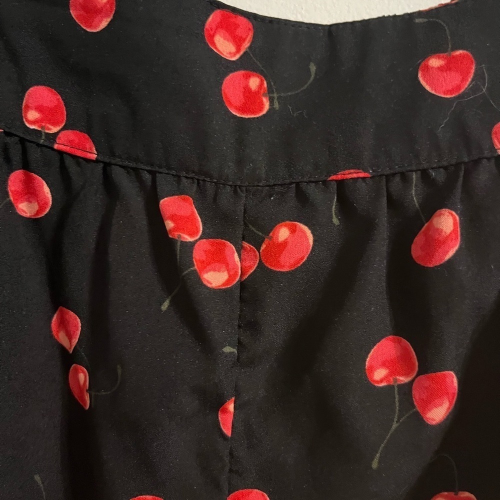 Black Shorts with Red Cherry Print Shorts are 11in long. 27in waist - Picture 2 of 3